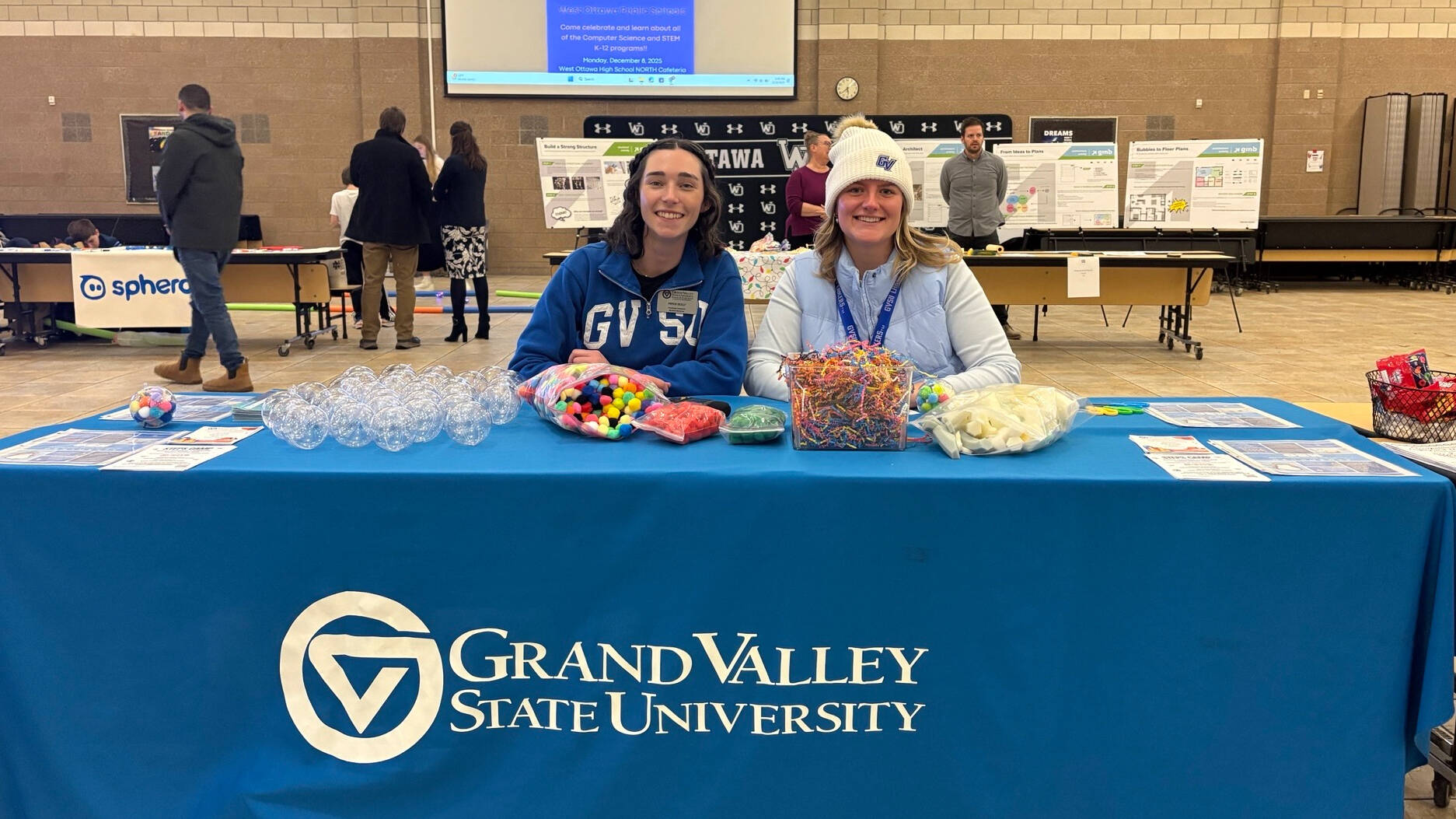 Staff tabling at 2025 West Ottawa STEM Night